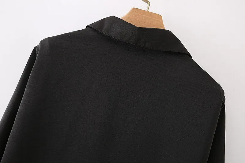 BLOUSE WITH BOW TIED