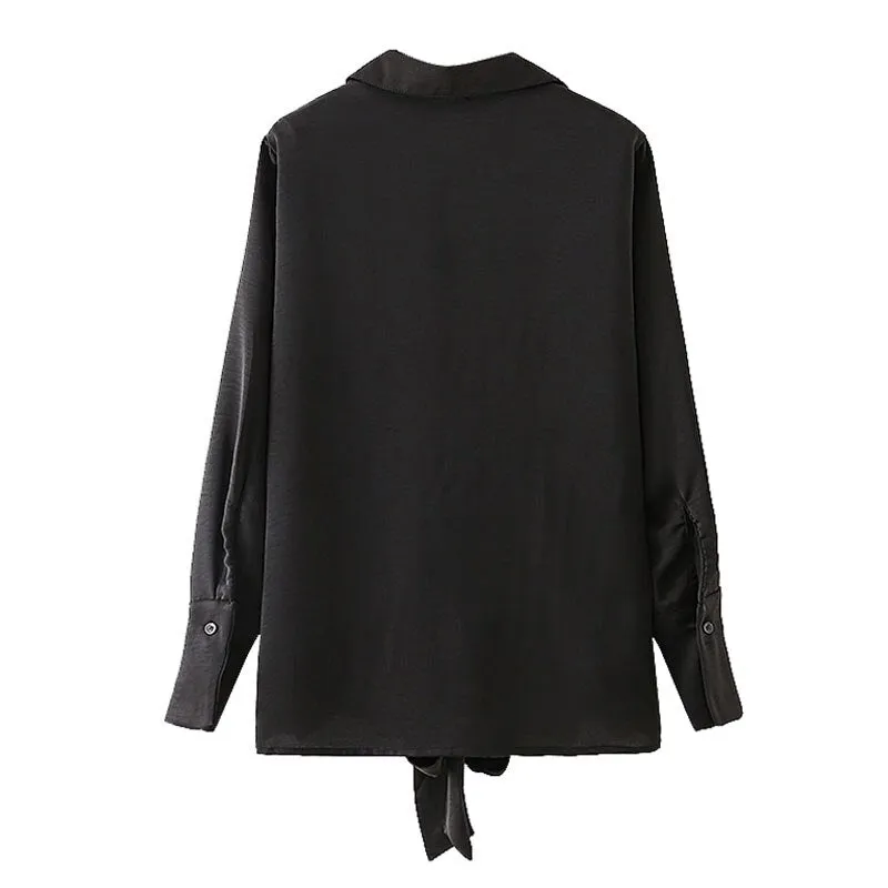 BLOUSE WITH BOW TIED