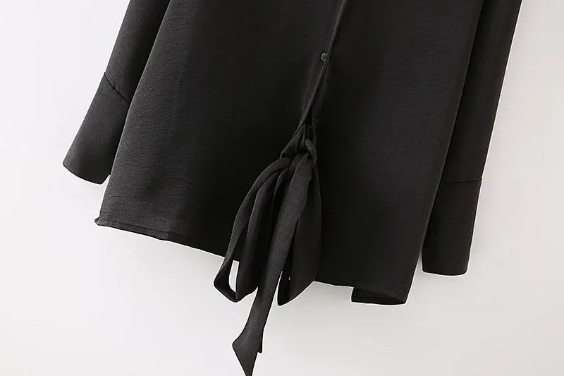 BLOUSE WITH BOW TIED